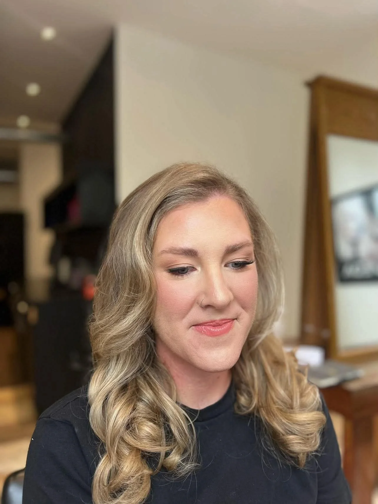 Soft glam makeup on blonde client